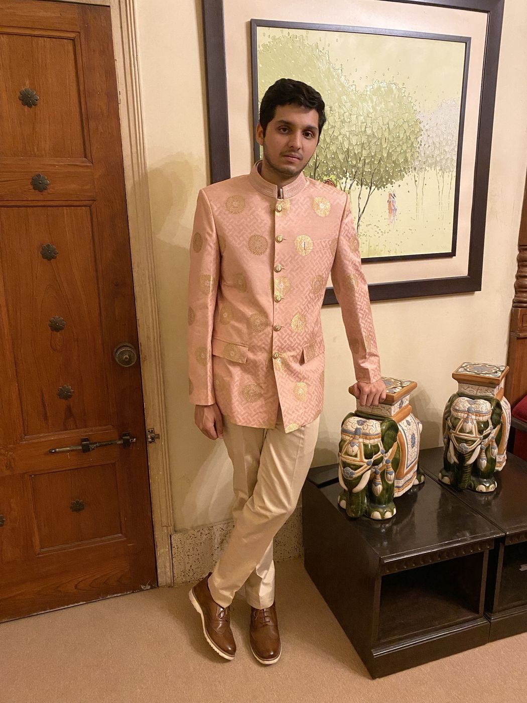 Standing portrait in a rose bandhgala